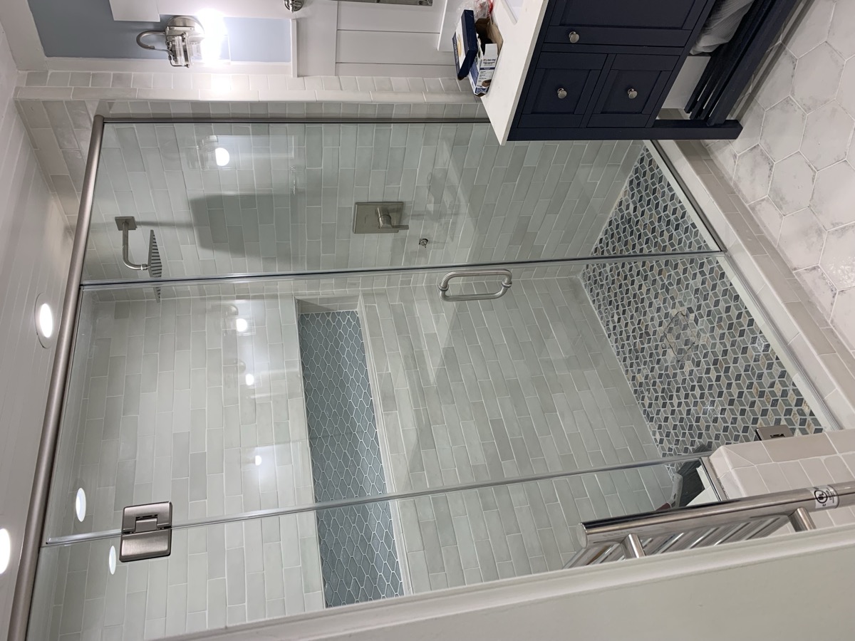 Glass shower door installation photo from Jul 2021