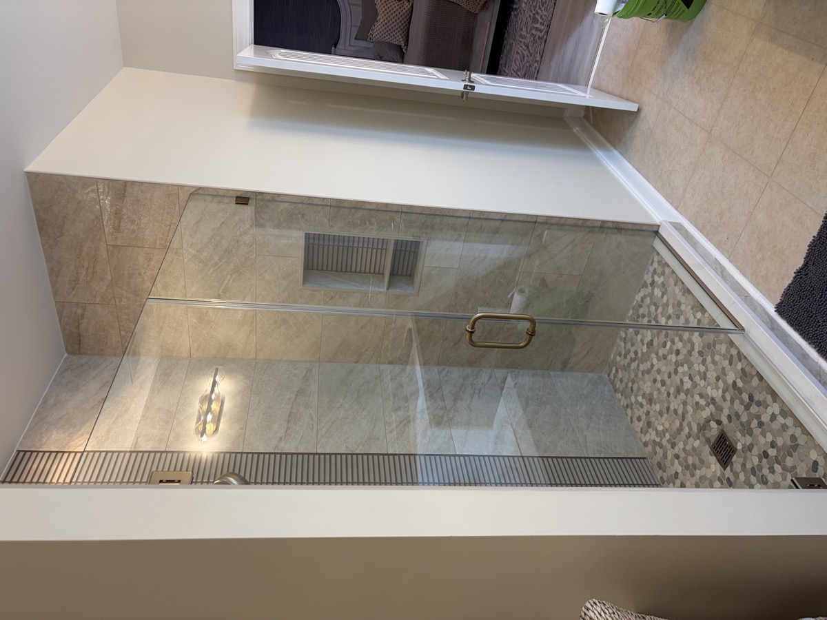 Frameless 3/8-inch glass shower enclosure